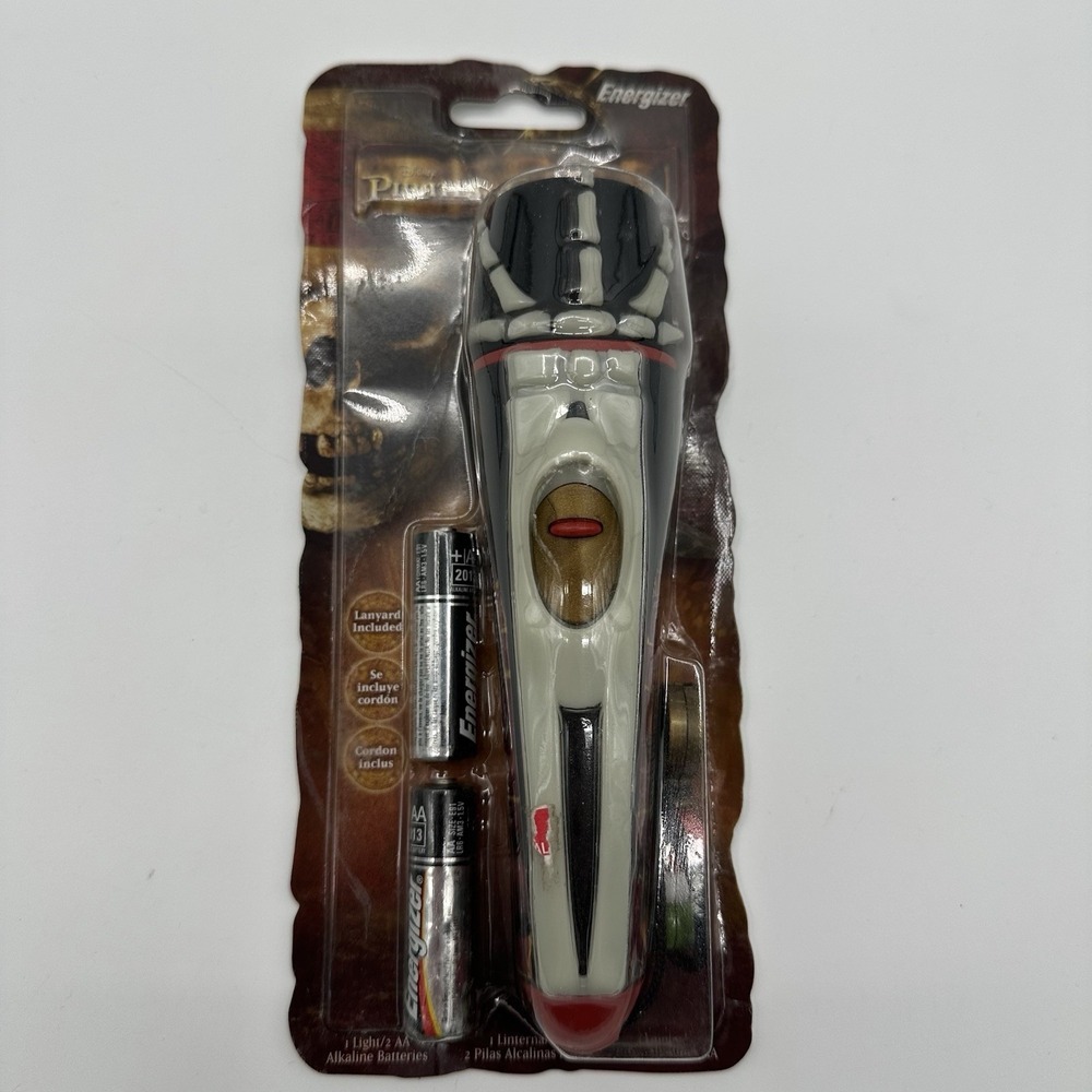 Disney PIRATES OF THE CARIBBEAN FLASHLIGHT Glow in the Dark Bone New old stock
